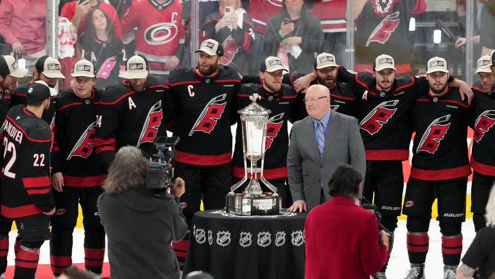 The Hurricanes pose for a photo after punching their ticket to the Stanley Cup Final.
