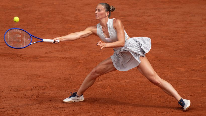 Marta Kostyuk returning a serve in 2026 Roland Garros.