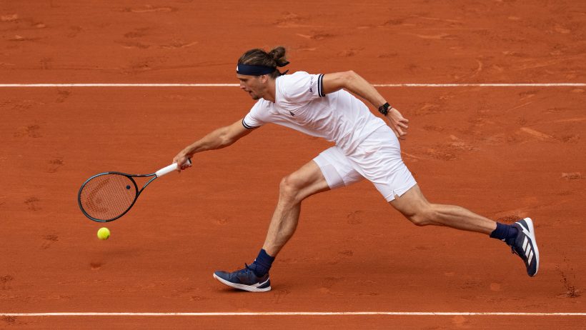 Alexander Zverev playing a point in 2026 Roland Garros.