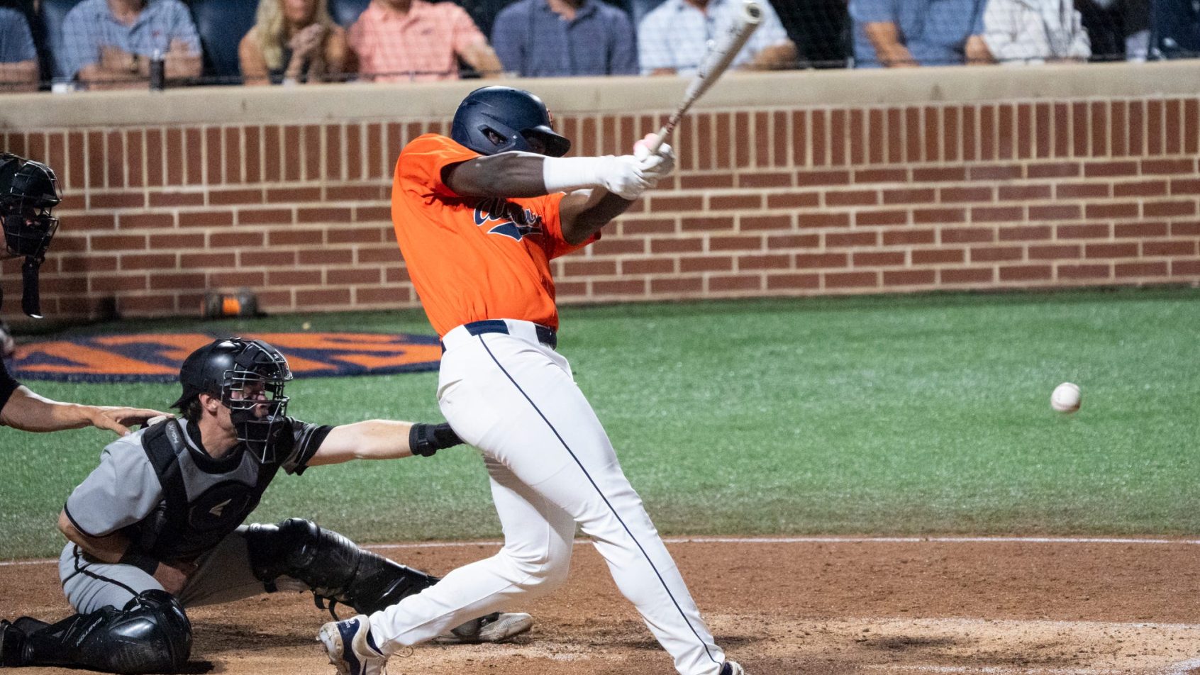 Auburn's Bub Terrell smacks a hit versus the Panthers in a Regionals matchup.