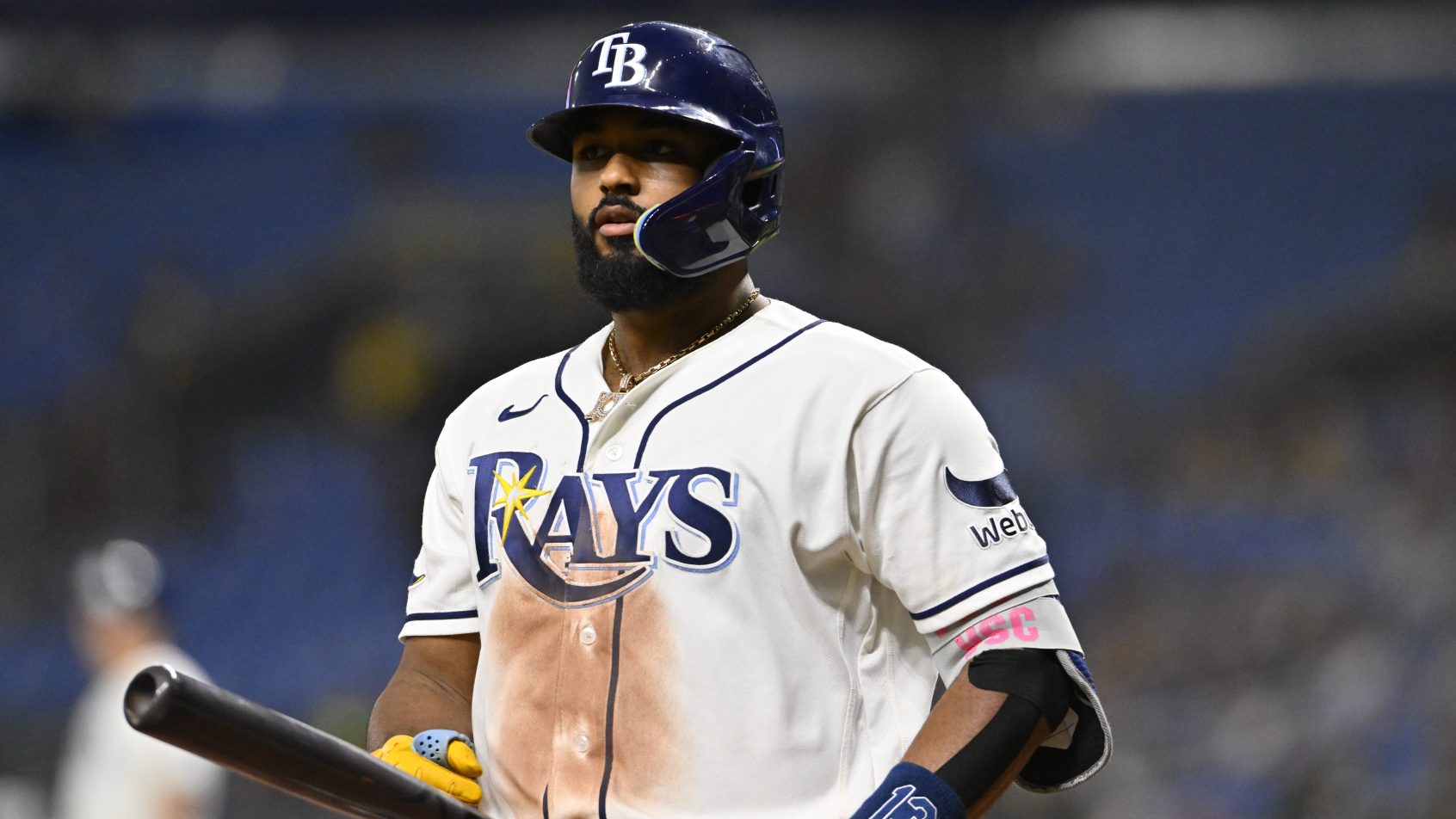 Junior Caminero holding bat