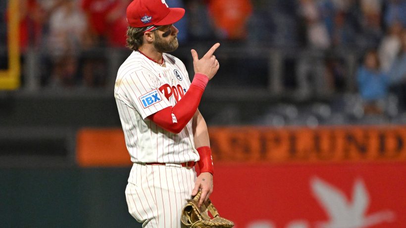 Bryce Harper pointing into stands