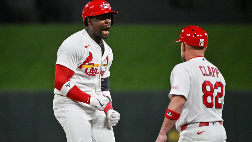 Jordan Walker celebrates a hit versus the Rangers.