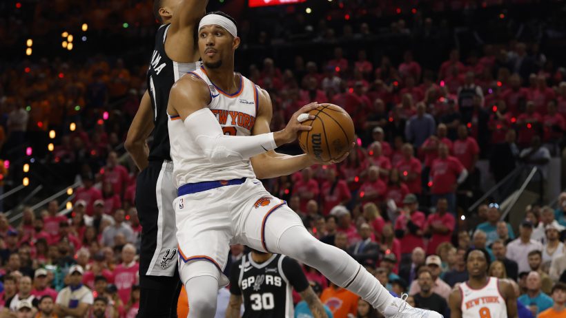 Josh Hart pulls down a rebound in Game 1 of the NBA Finals vs the Spurs.