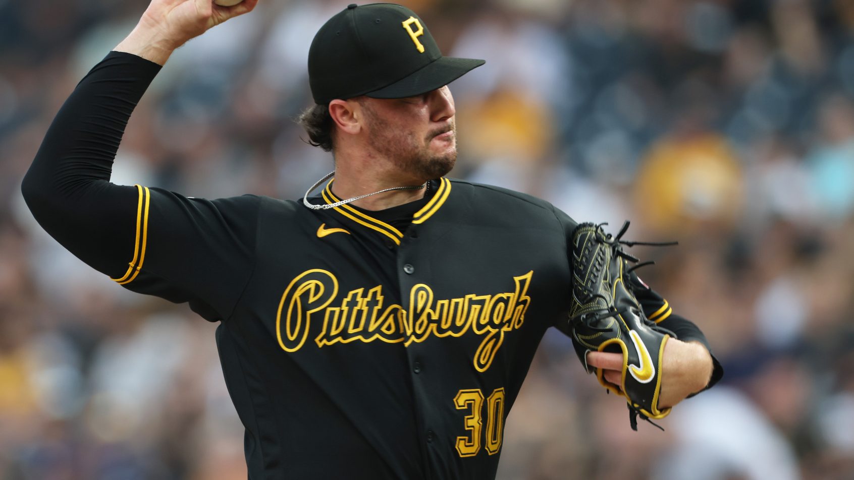 Paul Skenes delivers a pitch in a game vs the Dodgers.