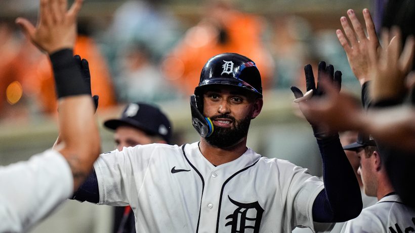 Riley Greene hi-fives in dugout