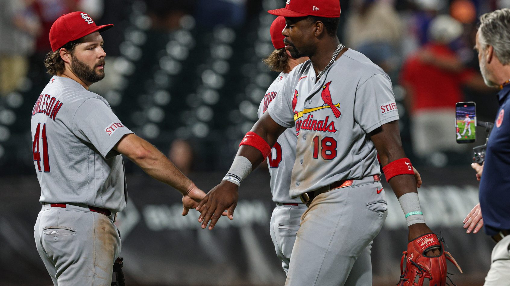 The Cardinals celebrate a victory over the Mets at Citi Field.