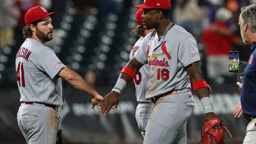 The Cardinals celebrate a victory over the Mets at Citi Field.
