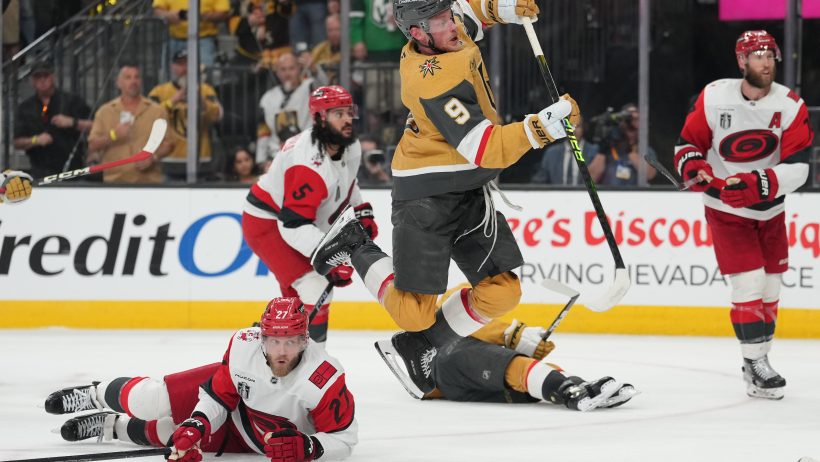 Jack Eichel shoots the puck
