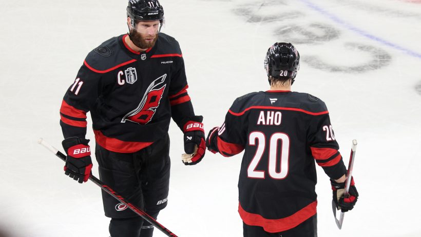 Carolina Hurricanes center Jordan Staal celebrates with center Sebastian Aho