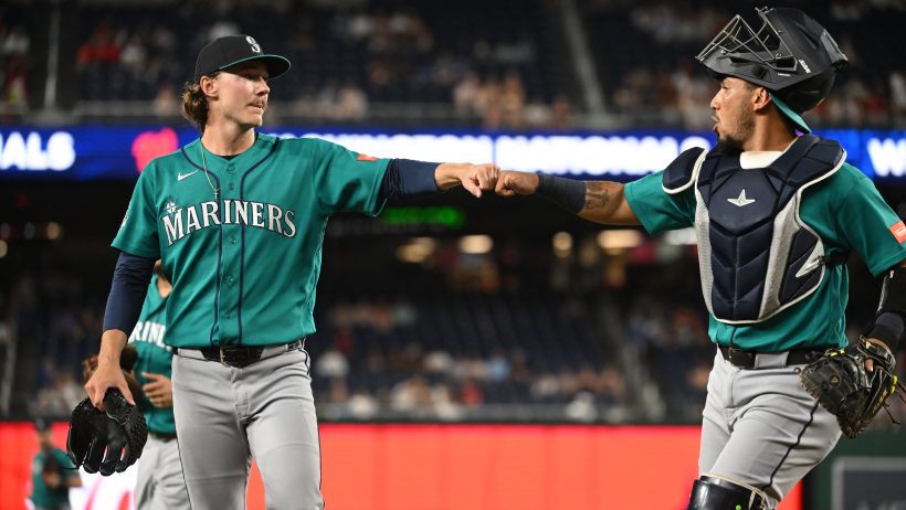 Bryce Miller fist bump with catcher