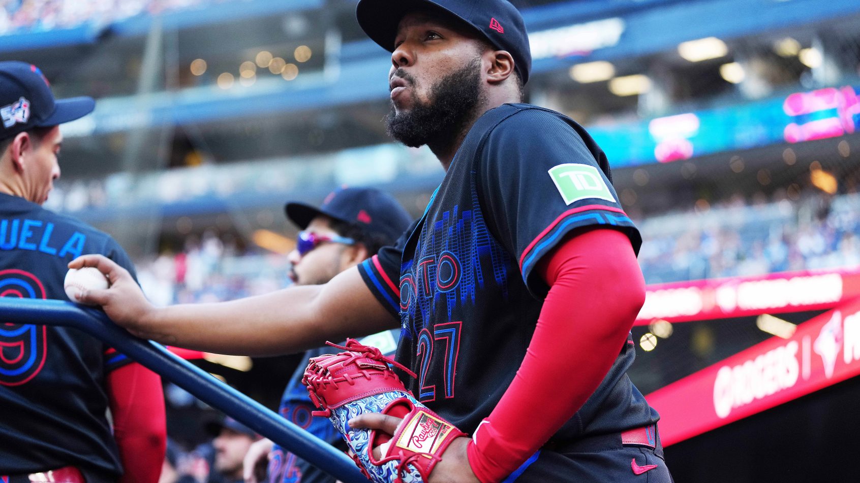 Vladimir Guerrero Jr standing in dugout