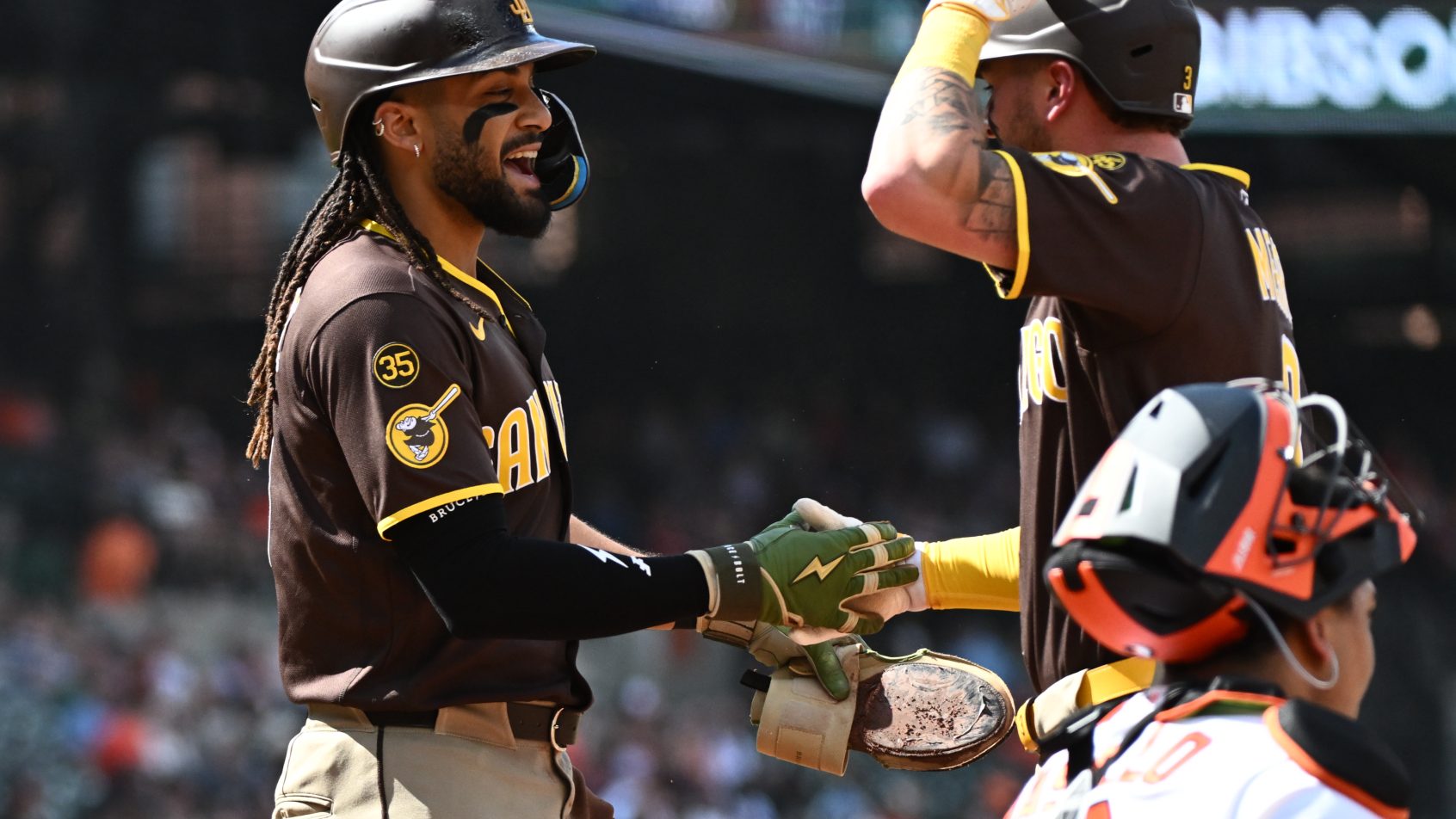 The Padres celebrate a home run in an Interleague game vs the Orioles.
