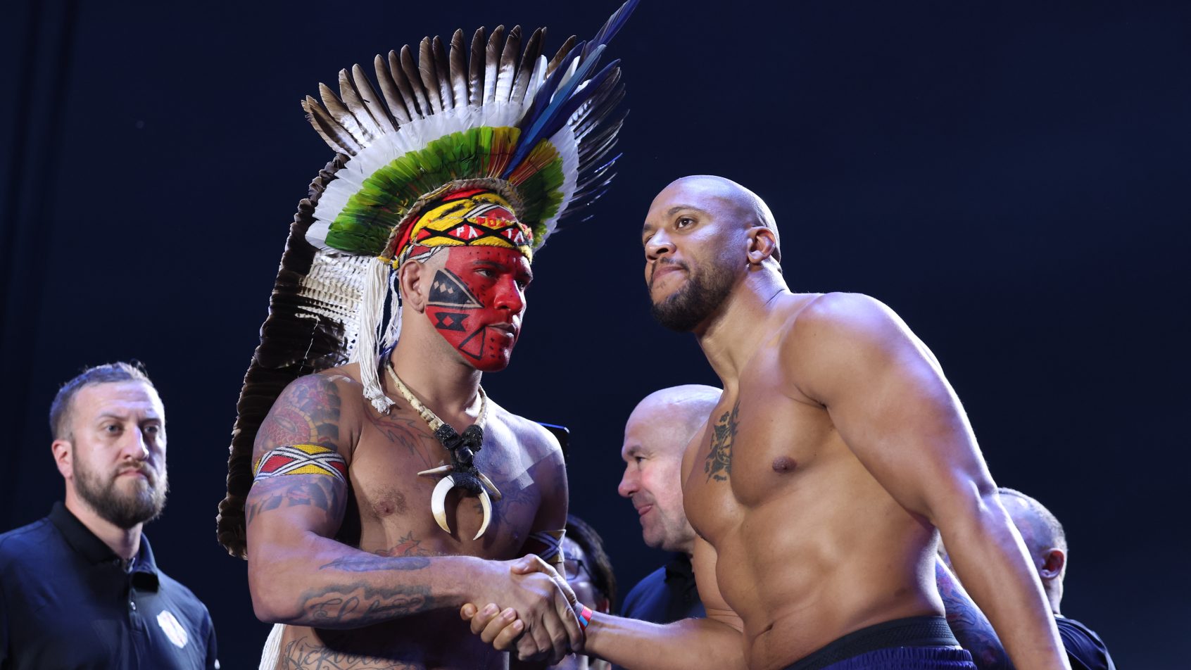 Jun 13, 2026; Washington, D.C., USA; Alex Pereira (left) and Ciryl Gane shake hands during weigh-ins for the UFC Freedom 250 at The Ellipse. Mandatory Credit: Amber Searls-Imagn Images