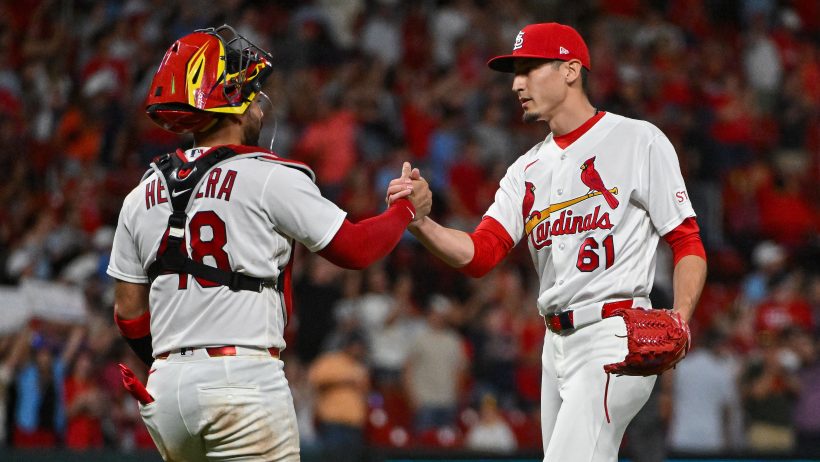 Ivan Herrera and Riley O'Brien celebrating for the St. Louis Cardinals.
