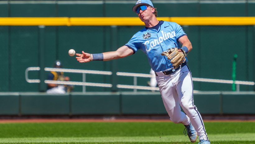 North Carolina Tar Heels third baseman Cooper Nicholson throwing first