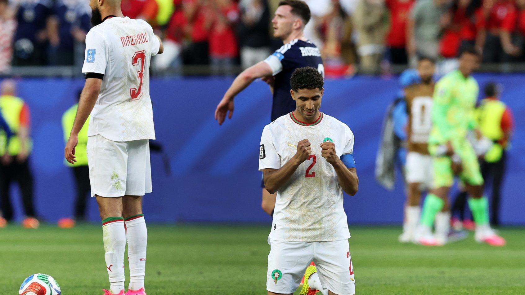 Morocco celebrates a World Cup victory over Scotland.
