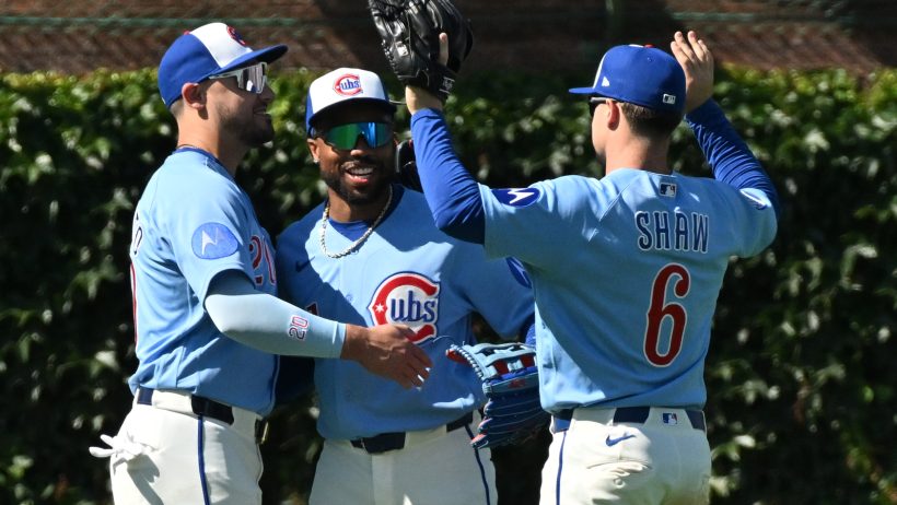 The Cubs celebrate a lopsided win over the Blue Jays.