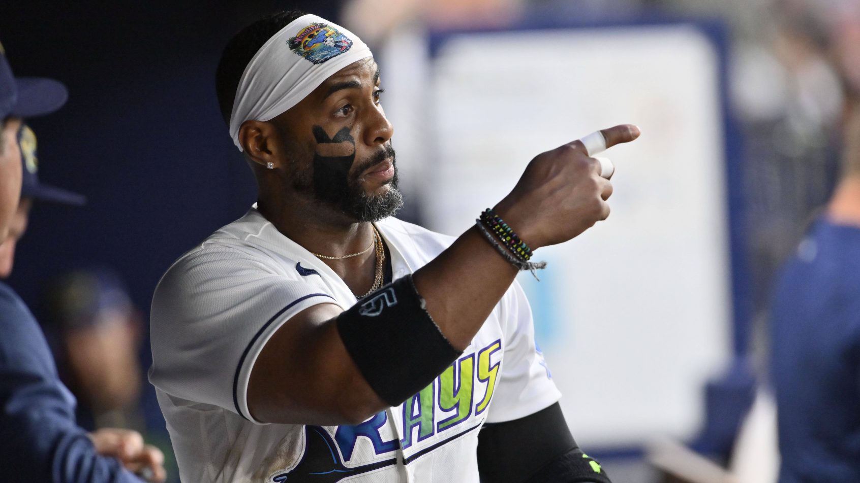 Yandy Diaz pointing in dugout.