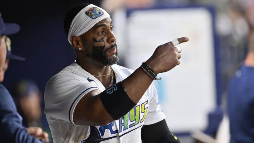 Yandy Diaz pointing in dugout.