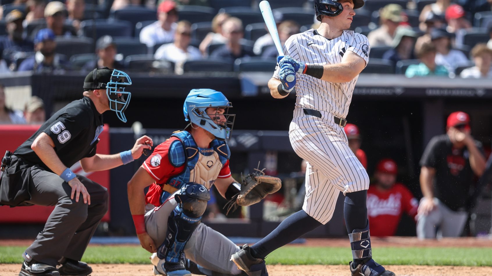 Ben Rice smacks a hit in a game versus the Cincinnati Reds.