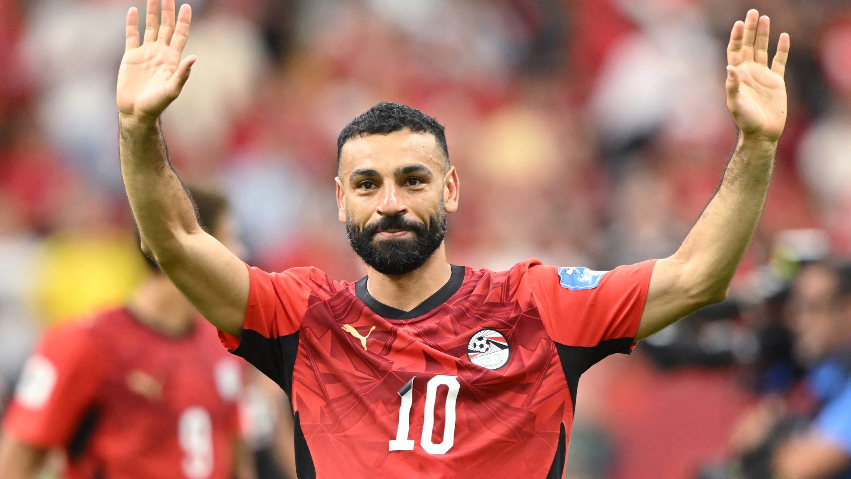 Mohamed Salah acknowledges the crowd after an Egypt match at the FIFA World Cup.