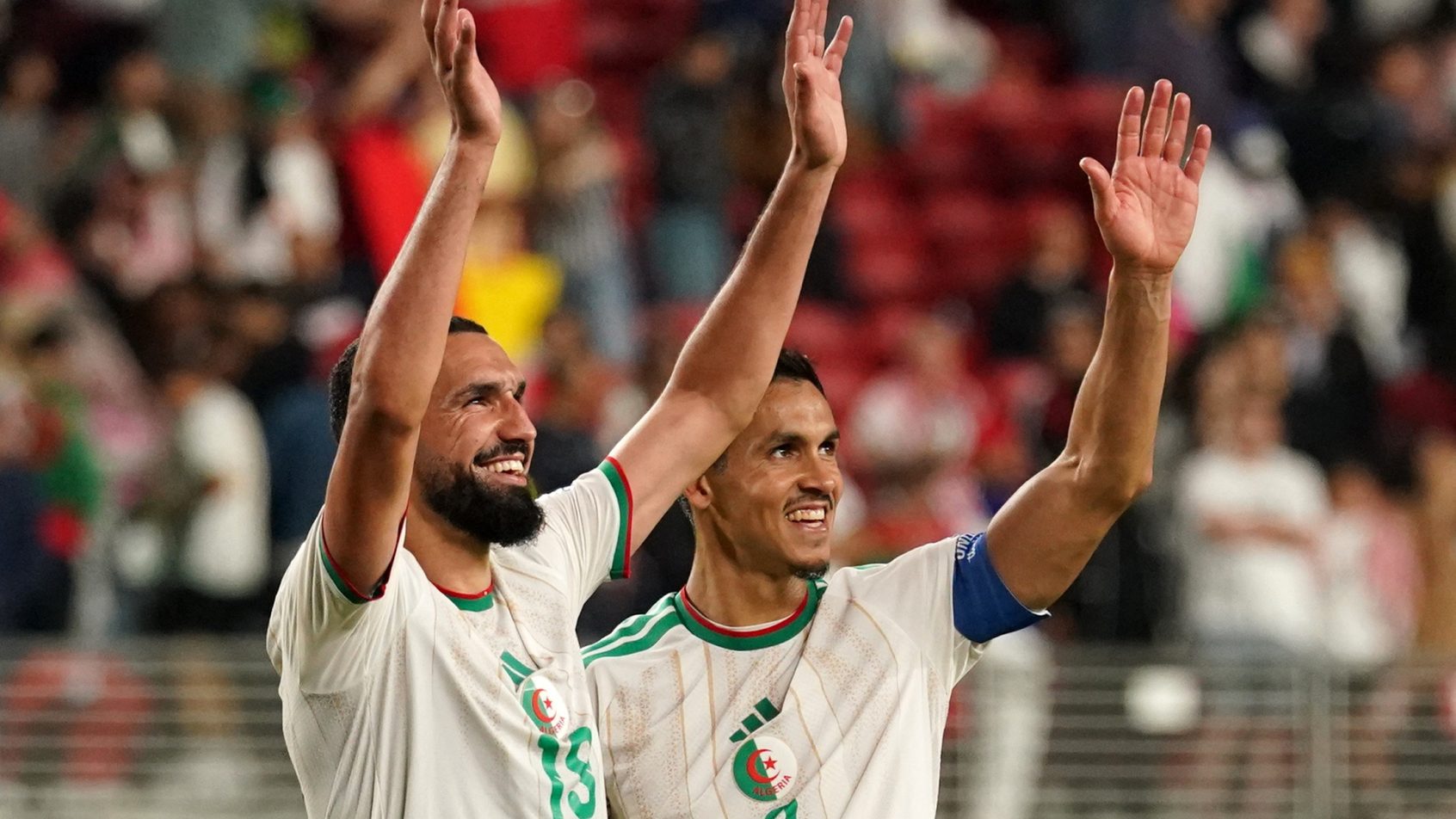 Algeria celebrates a World Cup win over Jordan.