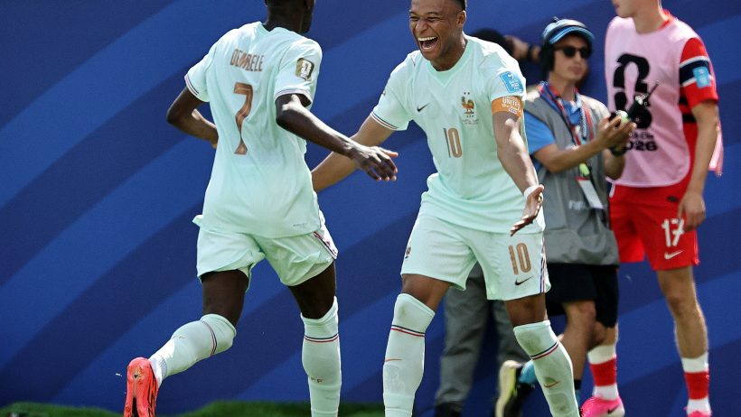 France's Ousmane Dembele and Kylian Mbappe celebrating a goal
