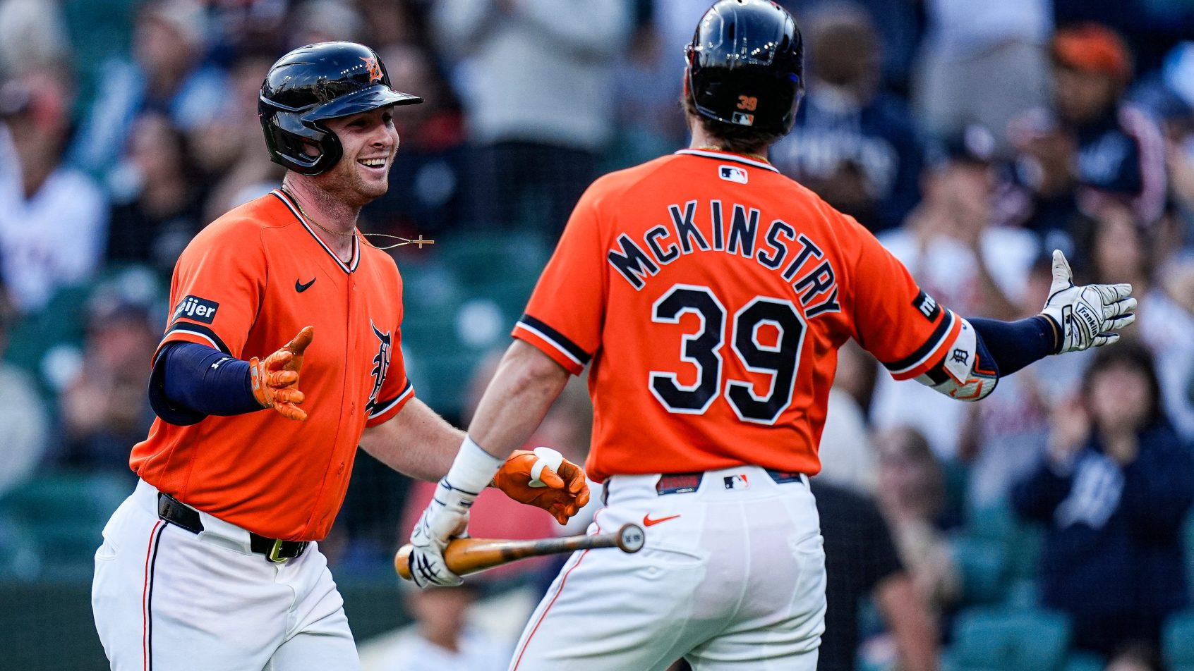 The Tigers celebrate a home run during a victory over the Astros.