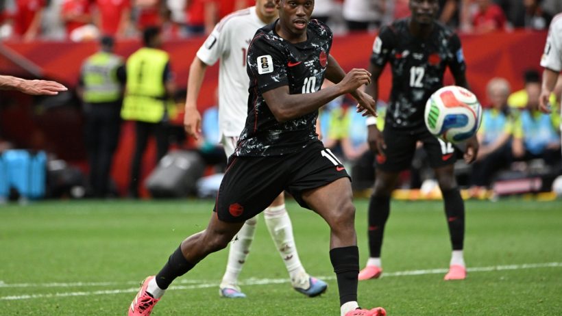 bet99 promo code SBD. Jonathan David dribbles for Canada.