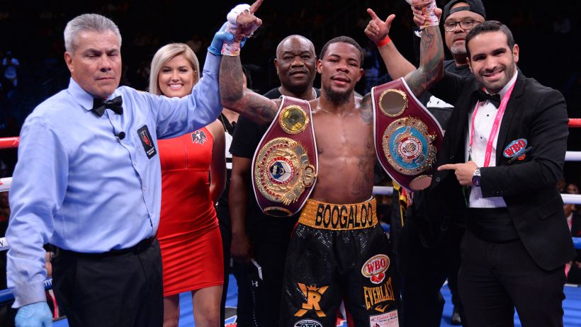 May 4, 2019; Las Vegas, NV, USA; Lamont Roach Jr. (black/yellow/red trunks) celebrates after defeating Jonathan Oquendo (not pictured) in their junior lightweight bout at T-Mobile Arena. Roach Jr. won via unanimous decision. Mandatory Credit: Joe Camporeale-USA TODAY Sports