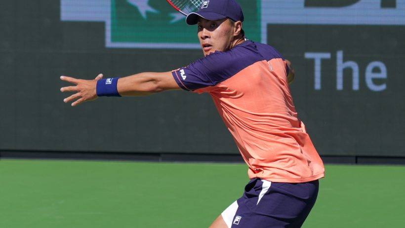 Brandon Nakashima hitting a forehand