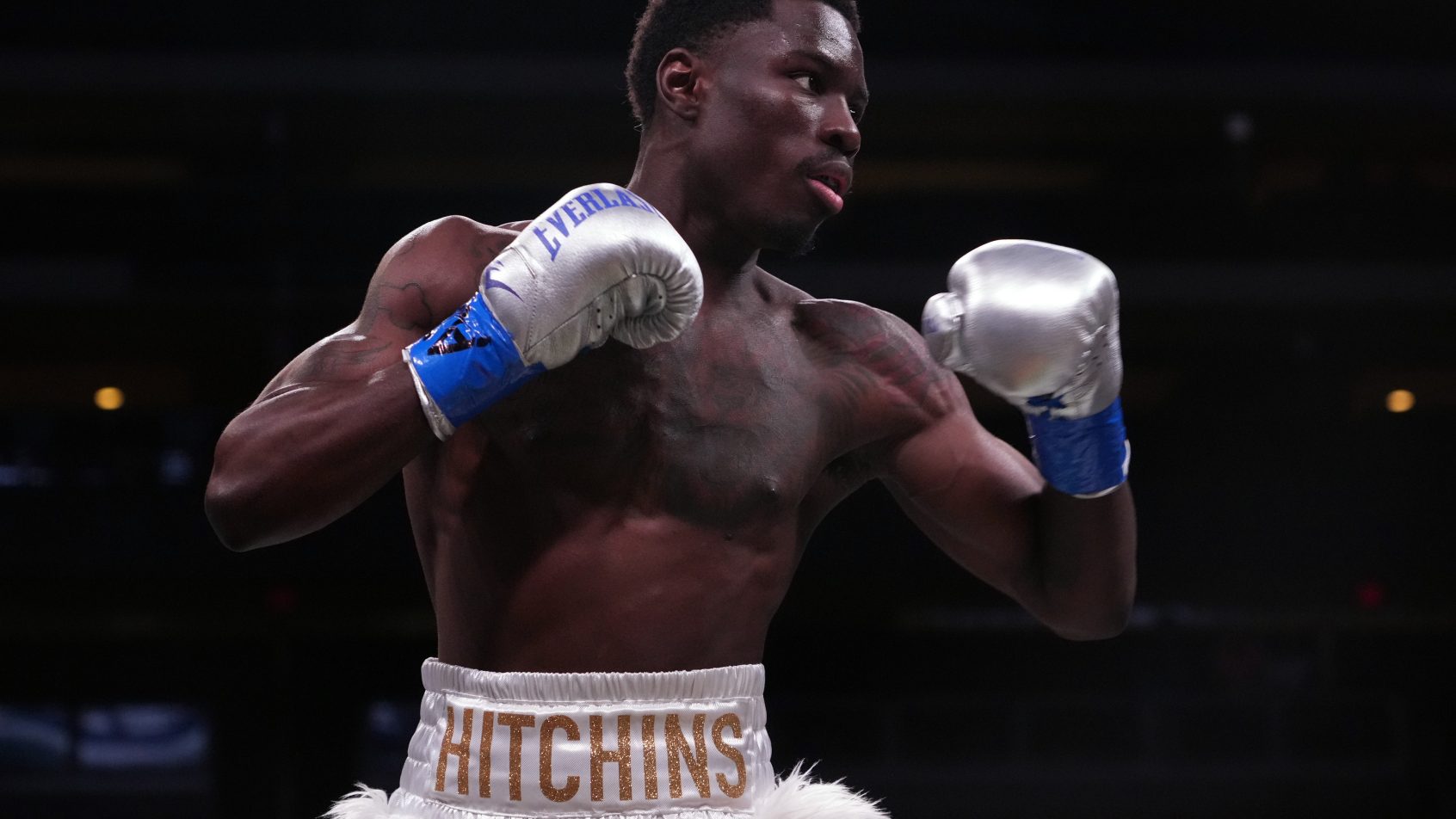 May 21, 2022; Glendale, Arizona, USA; Richardson Hitchins (gold trunks) and Angel Rodriguez (black trunks) box during a Premier Boxing Champions card at Gila River Arena. Mandatory Credit: Joe Camporeale-Imagn Images