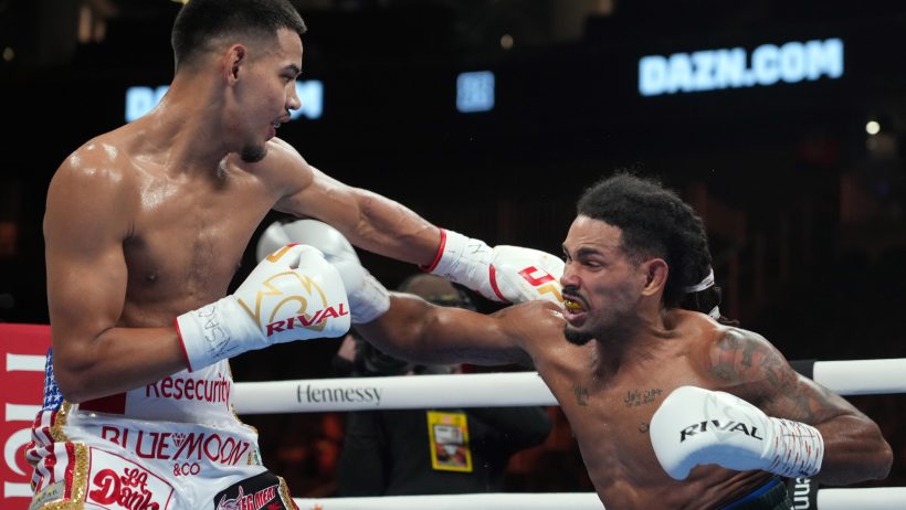 Sep 17, 2022; Las Vegas, Nevada, USA; Diego Pacheco (white trunks) and Enrique Collazo (green trunks) box during their boxing bout at T-Mobile Arena. Mandatory Credit: Joe Camporeale-Imagn Images