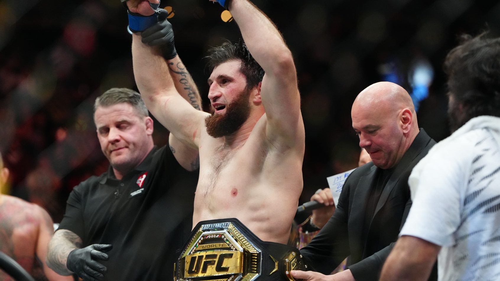 Mar 8, 2025; Las Vegas, Nevada, USA; Magomed Ankalaev (blue gloves) reacts after defeating Alex Pereira (not pictured) during UFC 313 at T-Mobile Arena. Mandatory Credit: Stephen R. Sylvanie-Imagn Images