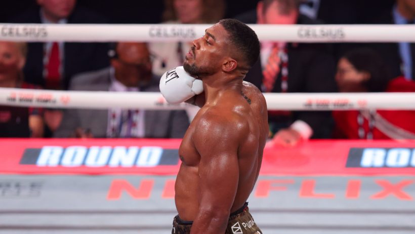 Dec 19, 2025; Miami, Florida, UNITED STATES; Anthony Joshua celebrates after defeating Jake Paul during a heavyweight boxing bout at Kaseya Center. Mandatory Credit: Sam Navarro-Imagn Images