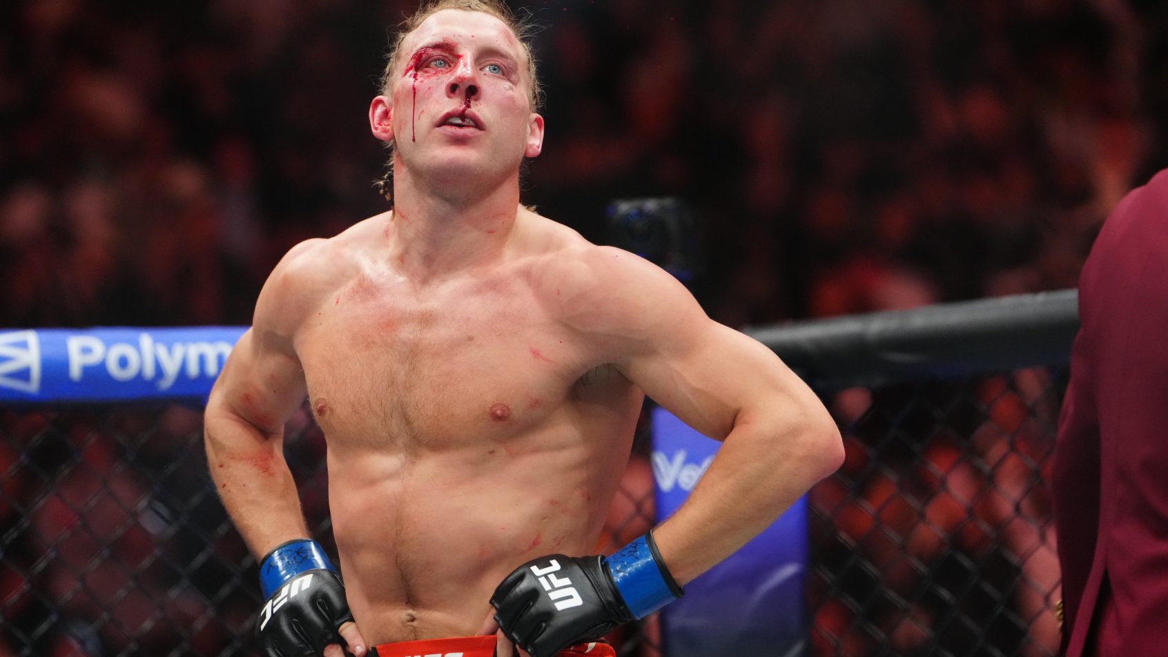 Paddy Pimblett reacts in the fight