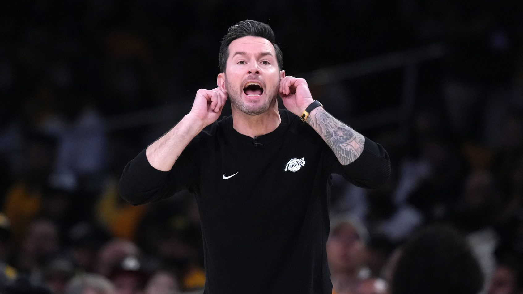 JJ Redick on the sidelines during a Lakers playoff game.