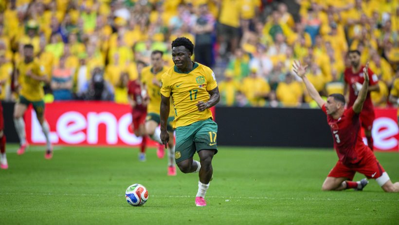 Australia forward Nestory Irankunda runs with the ball