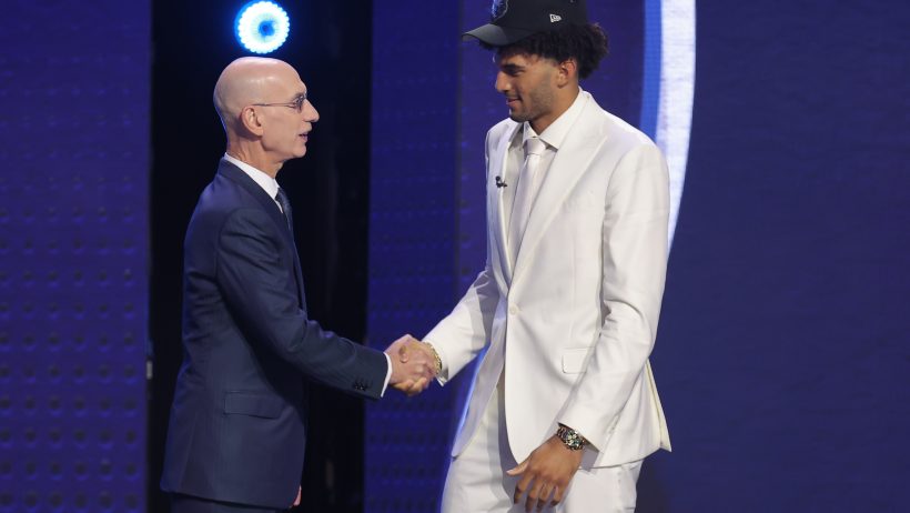 Cameron Boozer shakes hands with Adam Silver after being drafted 3rd overall.