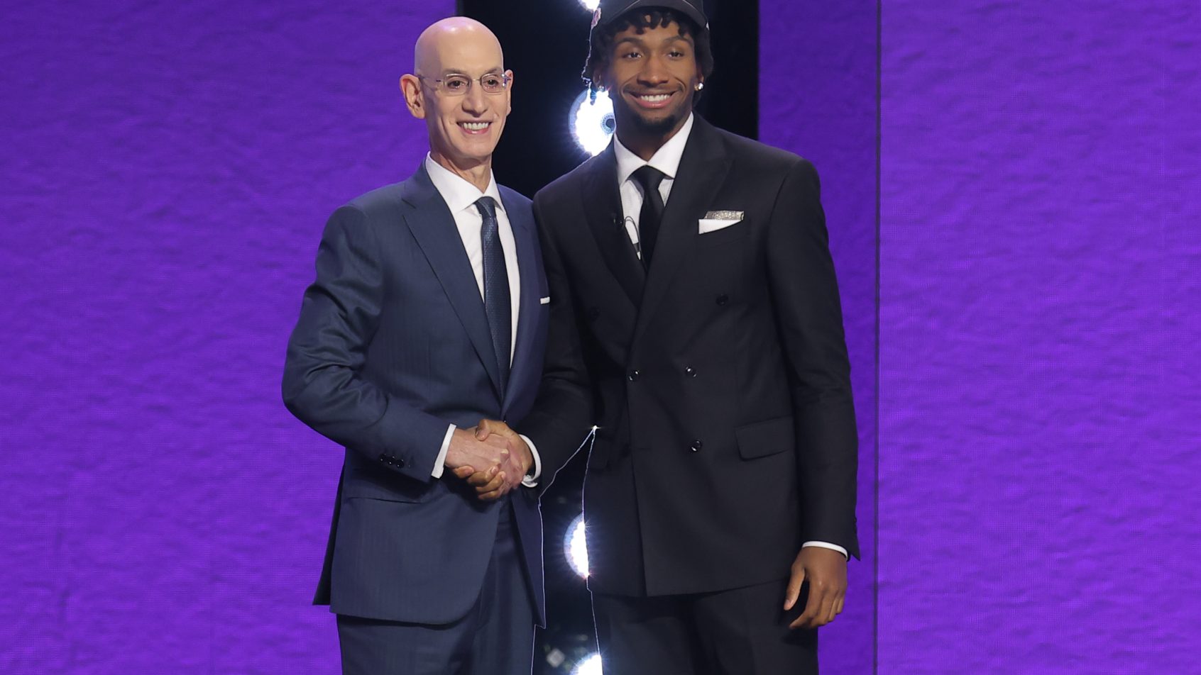 Darryn Peterson poses with Adam Silver on Draft night.
