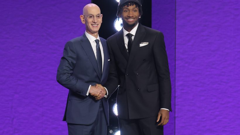 Darryn Peterson poses with Adam Silver on Draft night.