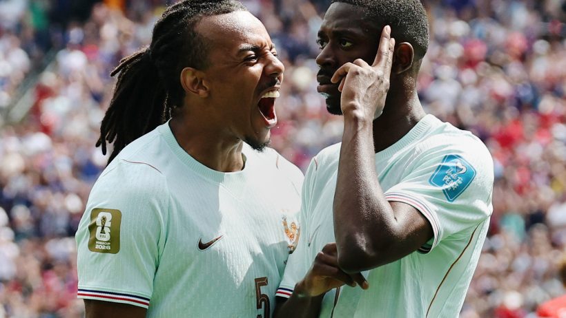 France's Ousmane Dembele celebrates a goal with Jules Kounde
