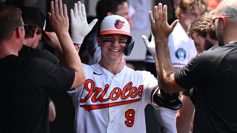 Tyler O'Neill celebrates a home run with his teammates.