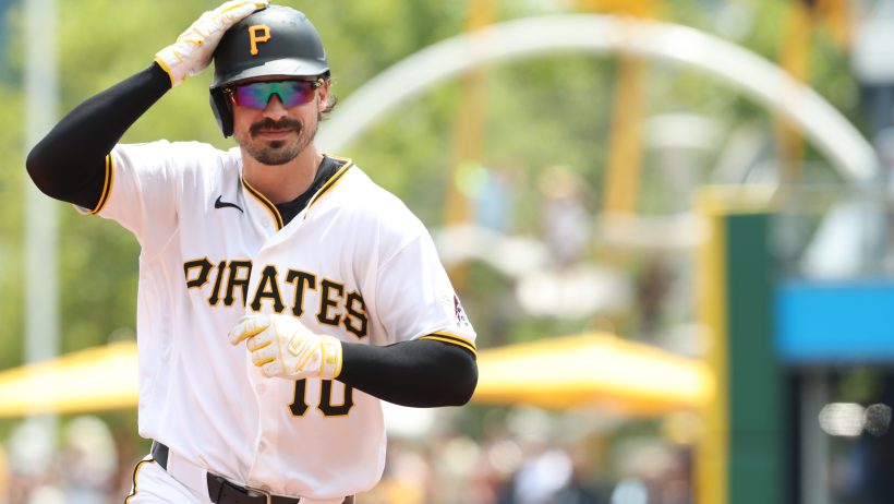 Bryan Reynolds running bases with hand on helmet