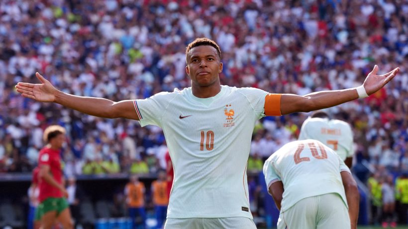 Kylian Mbappe celebrates scoring a goal versus Morocco.