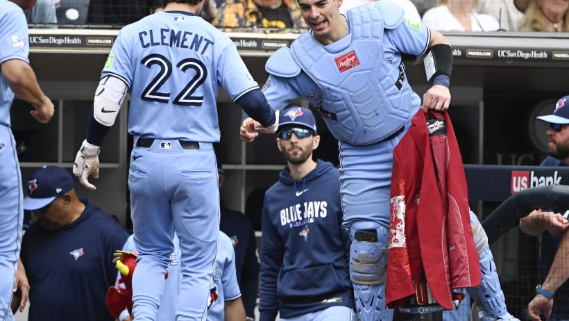 Ernie Clement celebrates with catcher Brandon Valenzuela