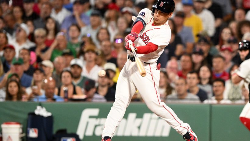 Masataka Yoshida swinging at pitch