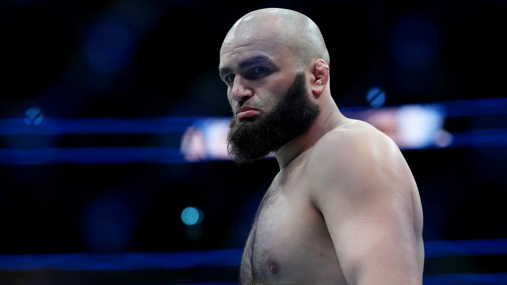 Shamil Gaziev looks on during a bout at UFC 296.