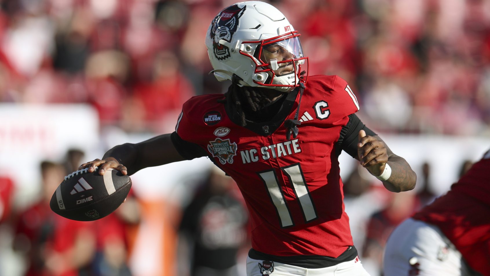 CJ Bailey launches a pass in a Bowl Game vs Memphis.